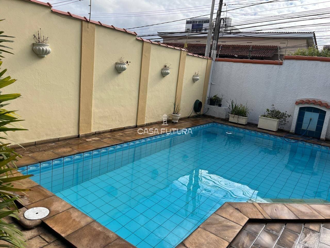 Casa com 4 quartos, 329 m² - foto 4